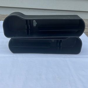 In between seat & center console storage